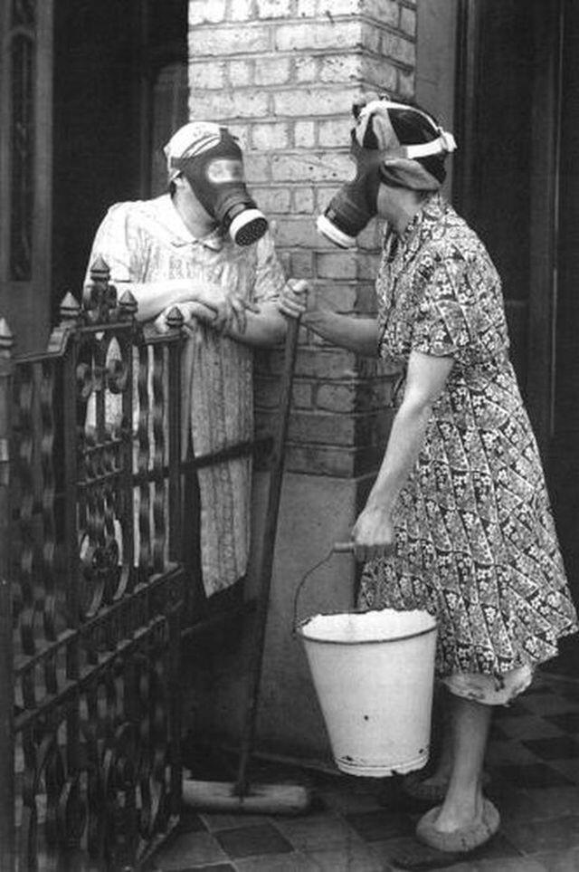 Housewives wearing gas masks during the Blitz on London showed the country's stubborn resistance, ca. 1940s.jpg